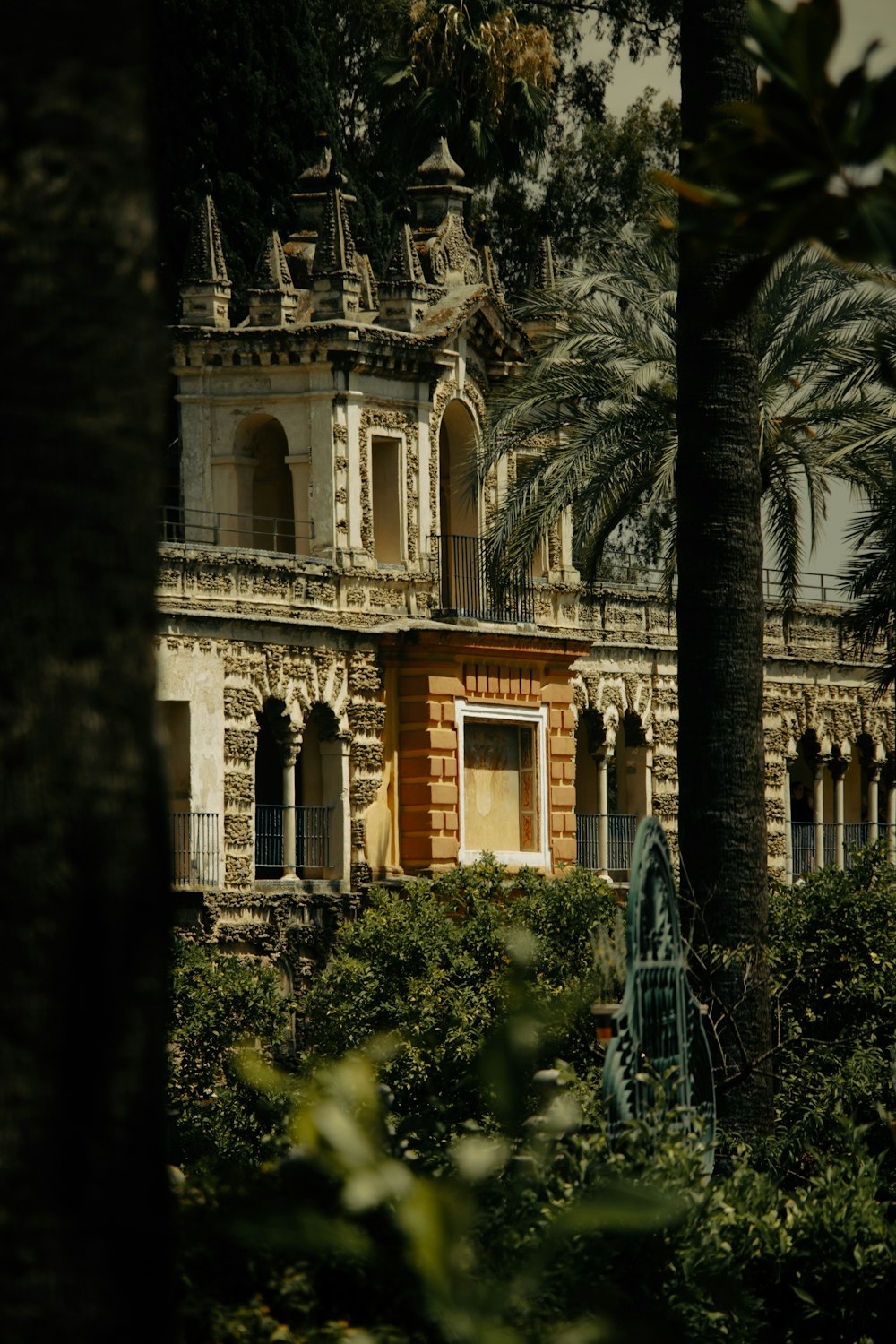 an old building with a tower and a balcony