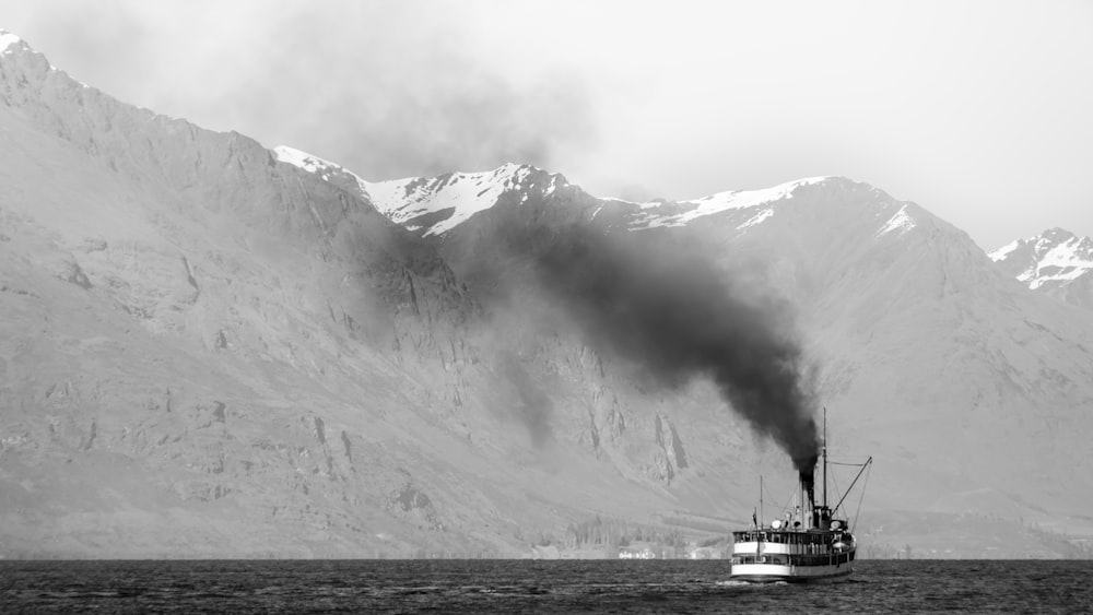 a boat floating on top of a large body of water