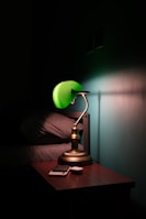 A colorful wireless lamp adding charm to a bedside table.
