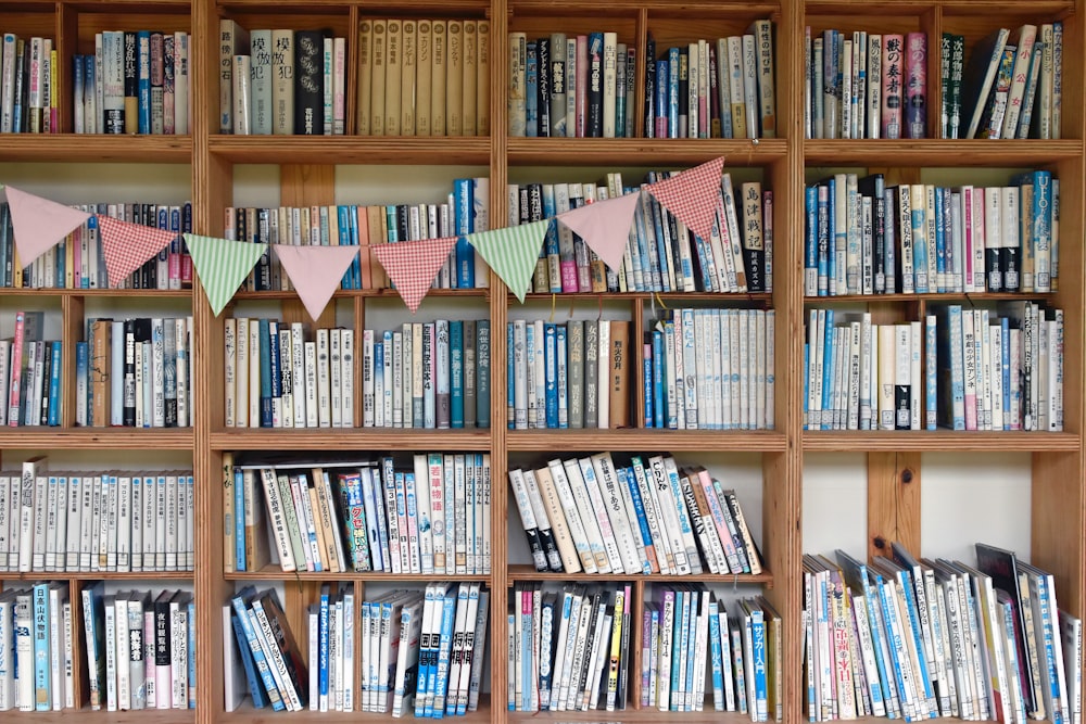 a book shelf filled with lots of books