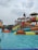 A joyful family enjoying water slides at Neo Planet.