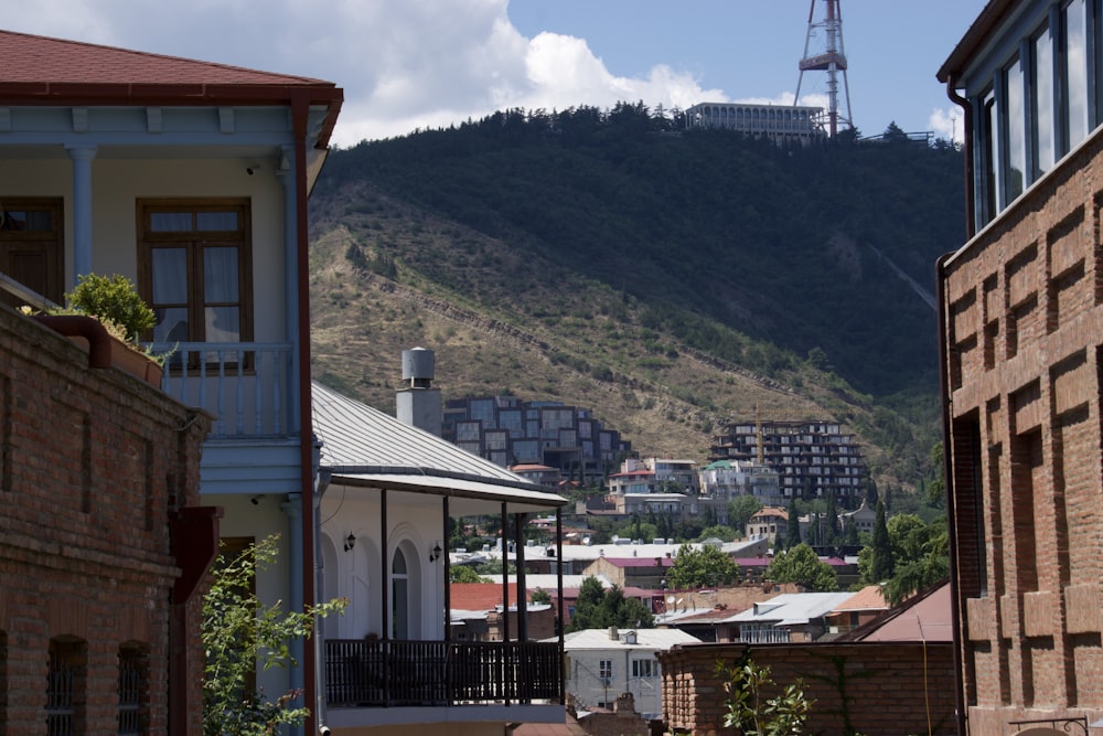 a view of a city with a mountain in the background