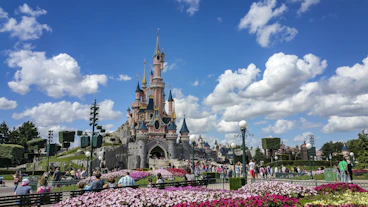 a castle with a lot of people around it