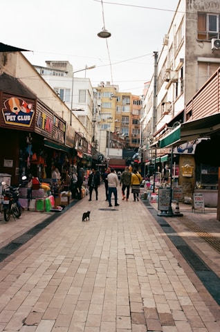 Ziv Katina exploring a vibrant street market during her travels.