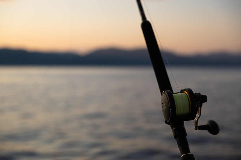 a fishing rod with a reel attached to it