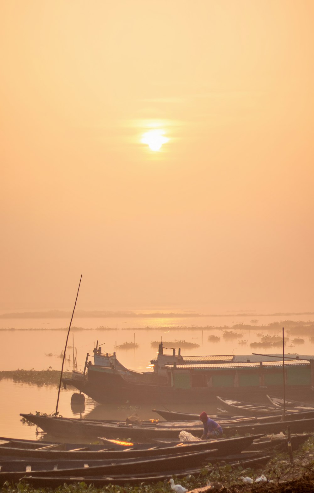 a couple of boats that are sitting in the water