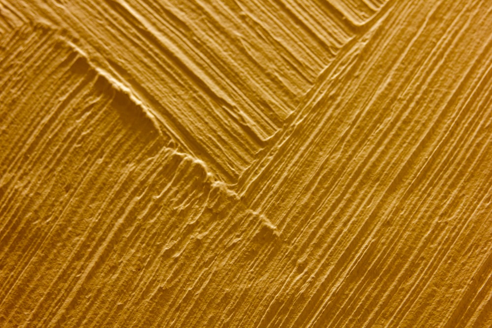 un primo piano di una trama di legno giallo