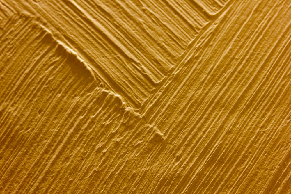 a close up of a yellow wood texture