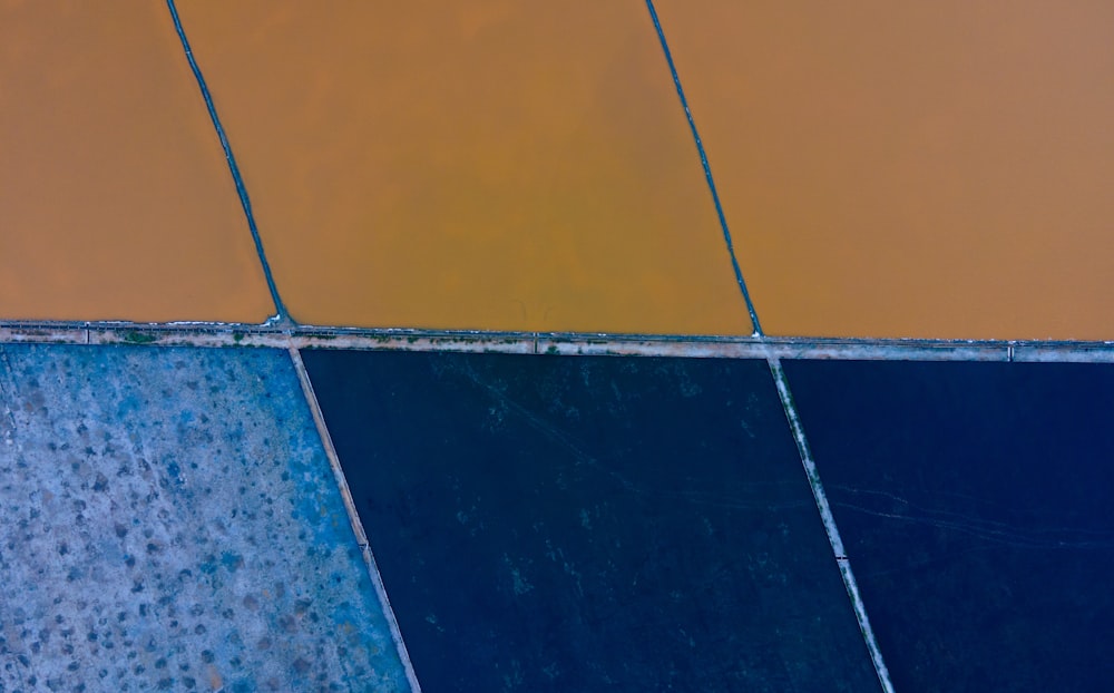 a close up of a tile floor with different colors