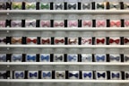 a display of many different colored bow ties
