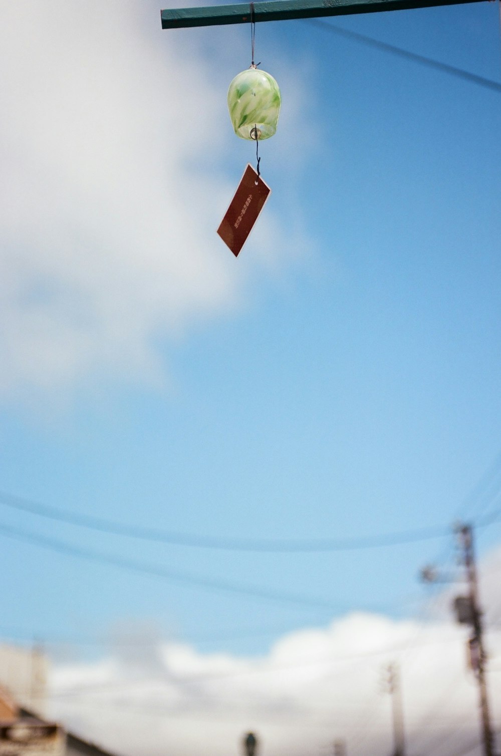 a street sign hanging from the side of a building