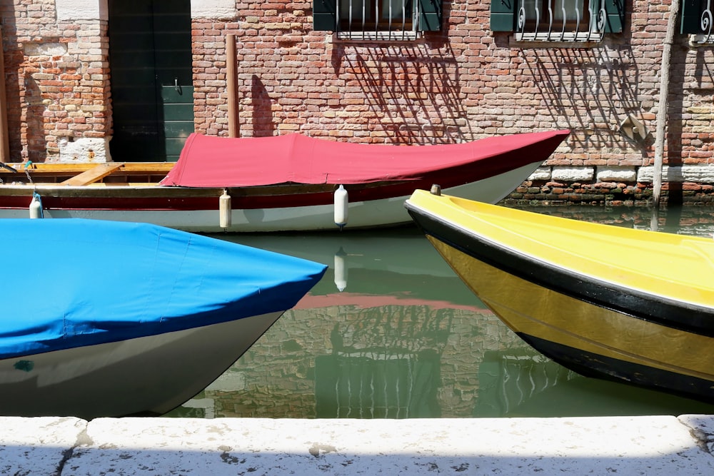 a couple of boats that are sitting in the water