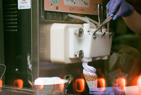 A robotic yogurt machine preparing customized yogurt.