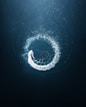 a circular object floating in the middle of the ocean