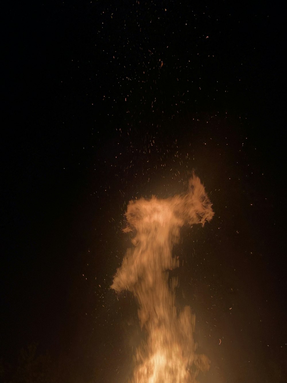 a person jumping in the air on a snowboard