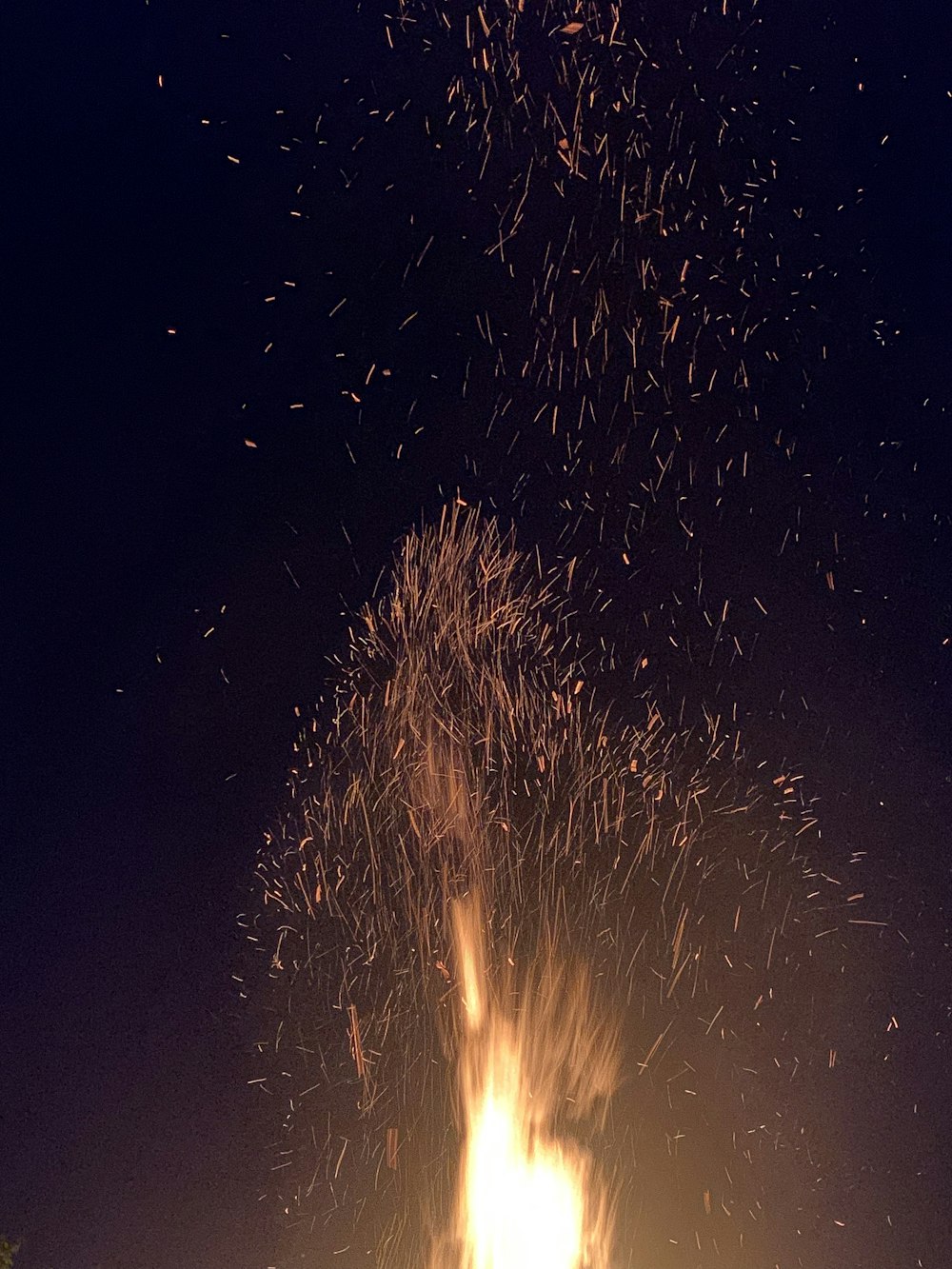a fire with lots of sparks coming out of it