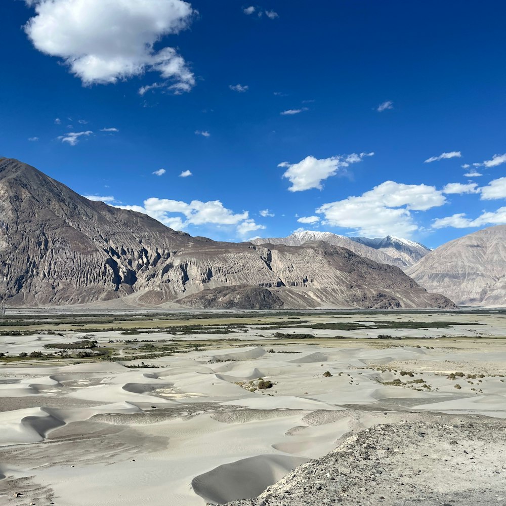 a view of a mountain range in the desert