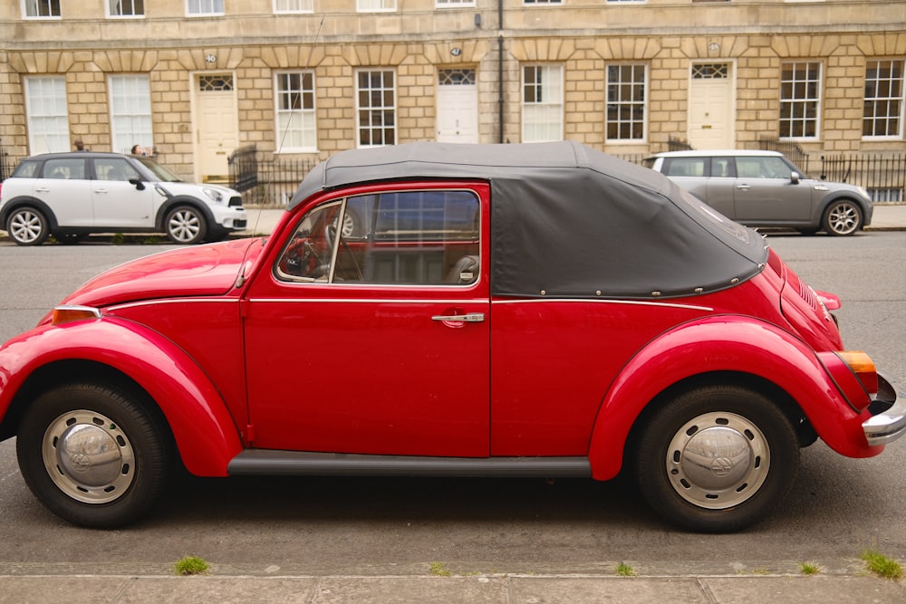 a red car parked on the side of the road