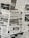 The image contains a collage of various international newspaper front pages, featuring headlines and images related to global news events. The papers have sections in different languages such as English, Italian, and Hebrew. Prominent topics include political issues and events, with accompanying black-and-white photographs.