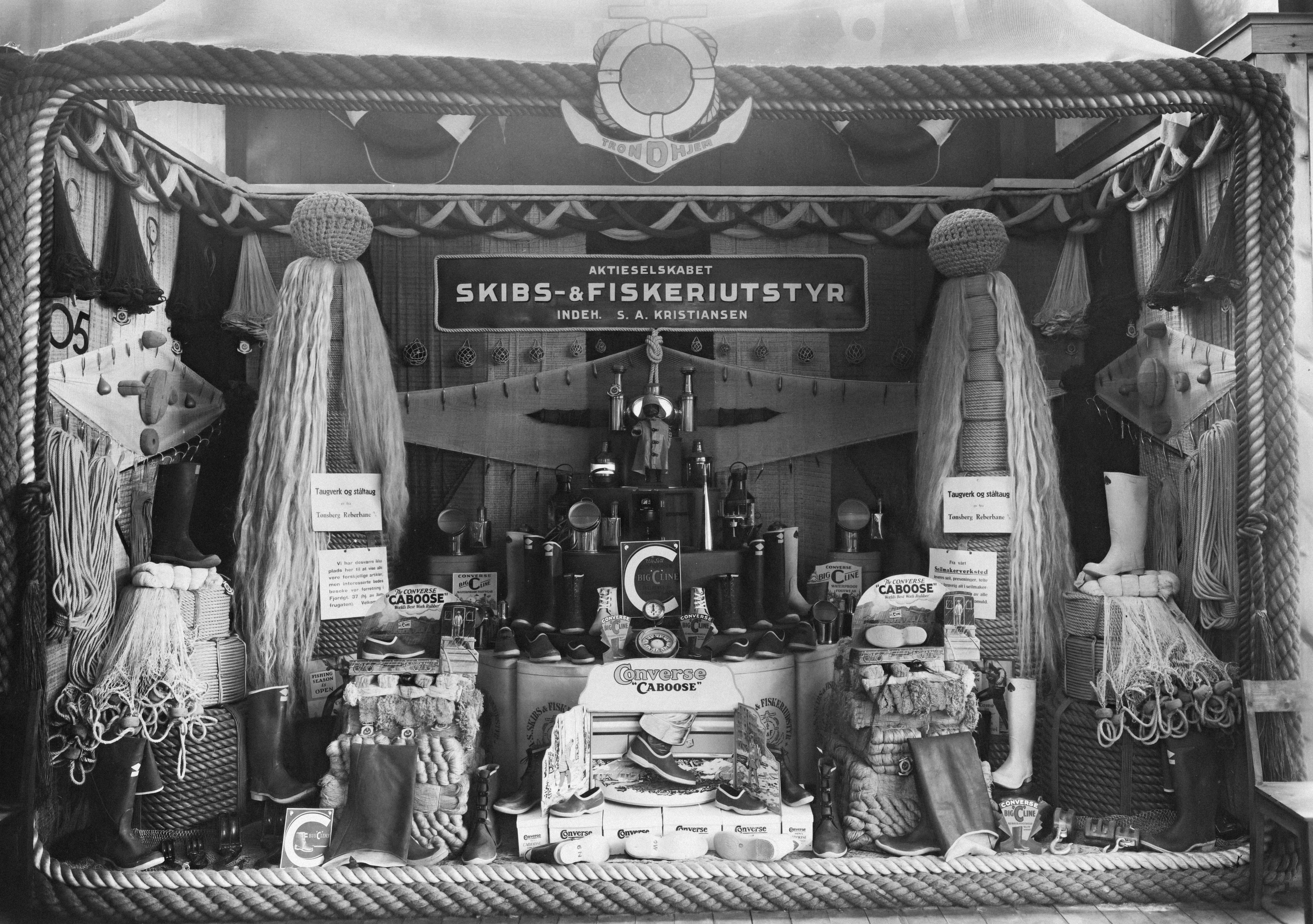 a black and white photo of a store front