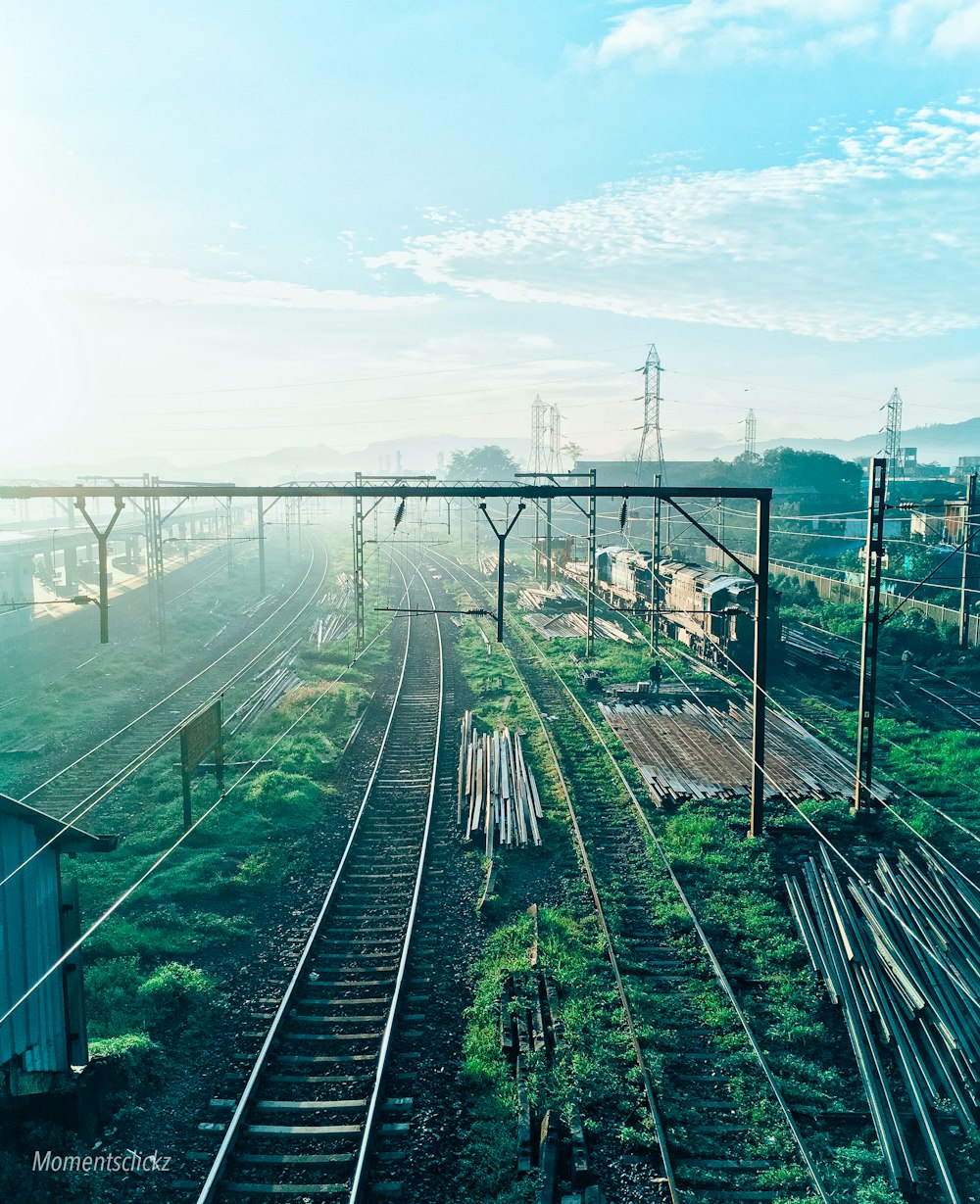 a view of a train track with a sky background