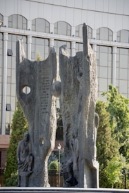 Wide shot of an outdoor installation featuring abstract stone sculptures by burgio&gomez studio.