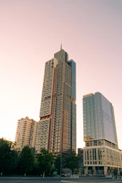 Evening cityscape showing a newly developed residential area with high-rise buildings.
