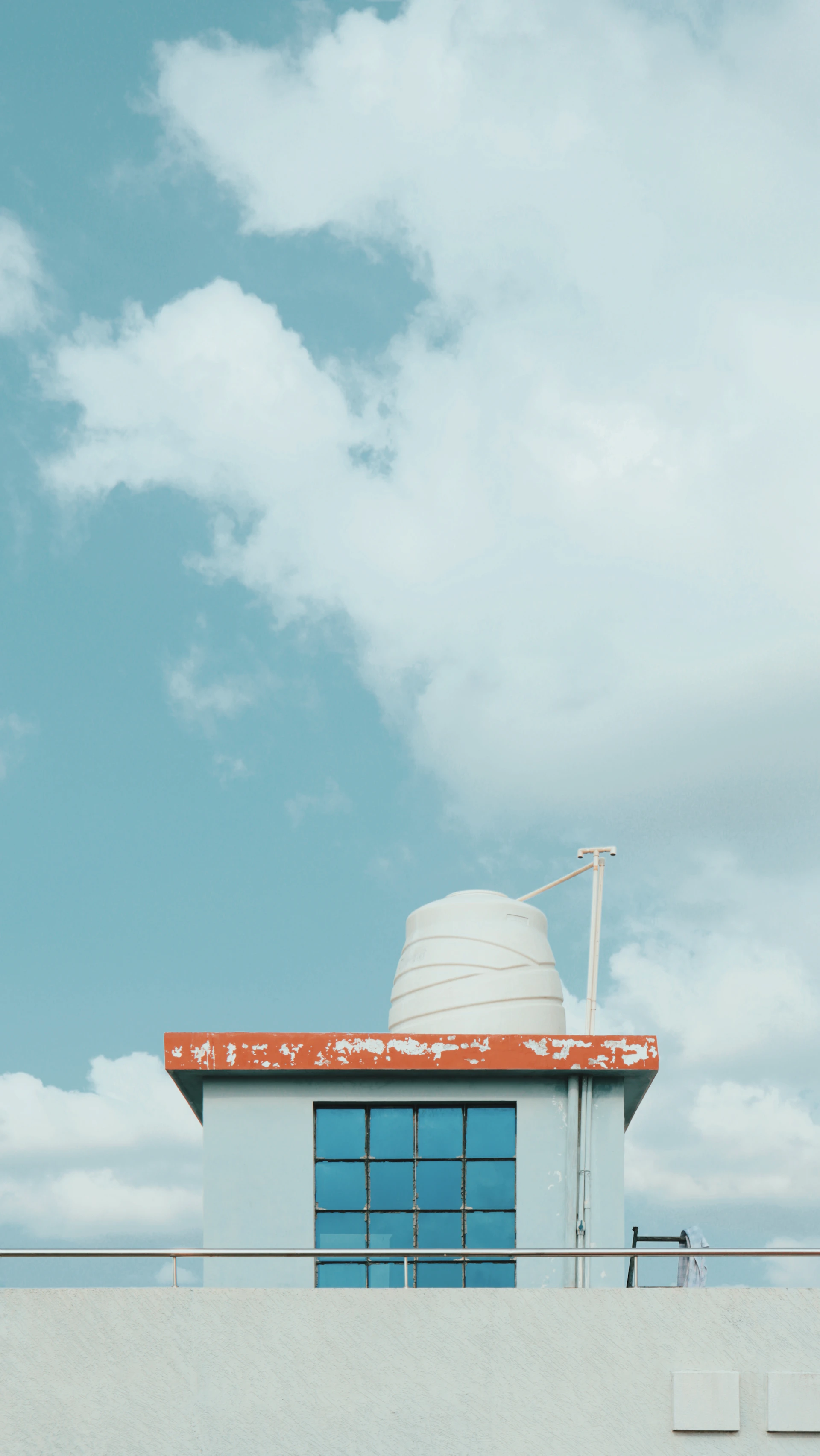 woman wearing yellow long-sleeved dress under white clouds and blue sky during daytime