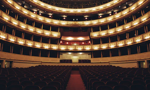 a large auditorium filled with lots of chairs