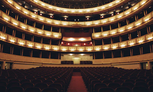 a large auditorium filled with lots of chairs
