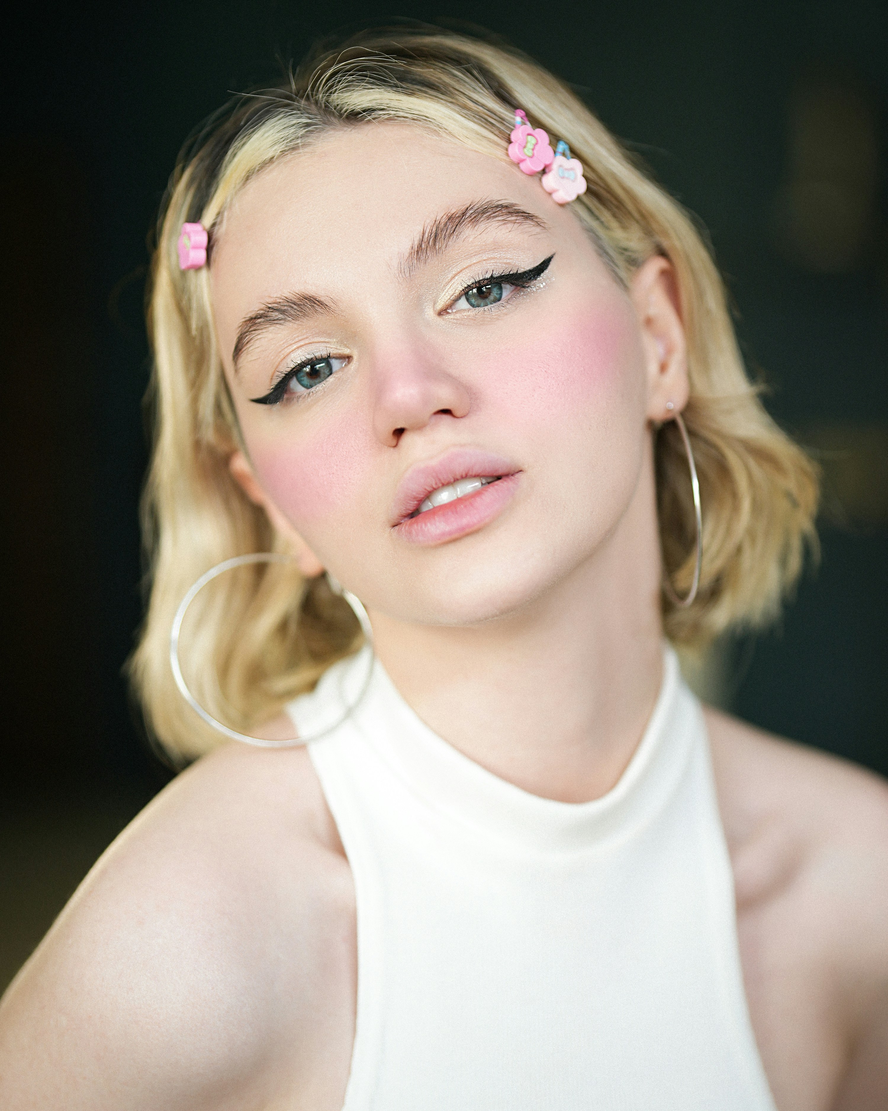 a woman with a flower in her hair