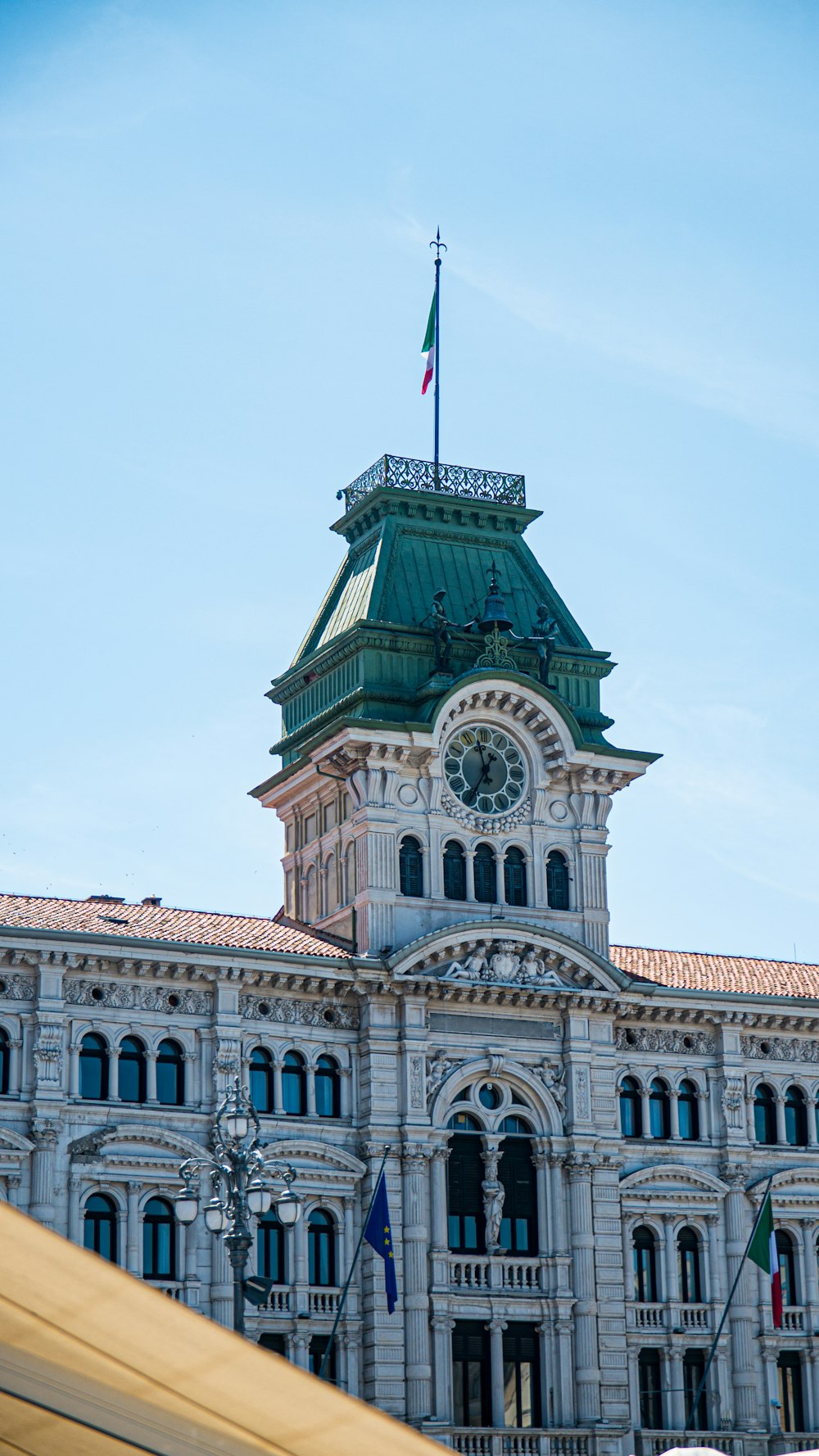 a large building with a clock on the top of it