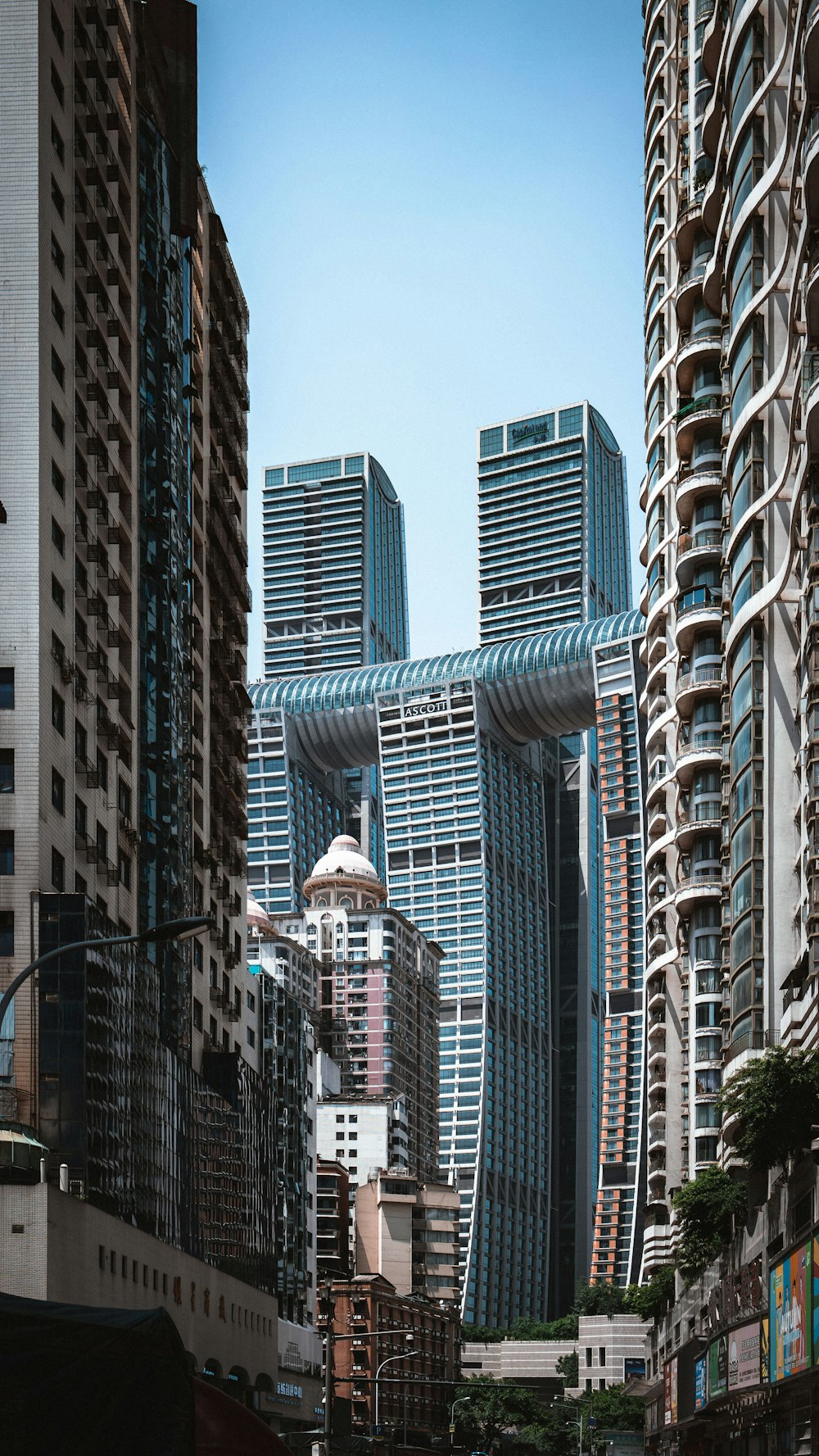 a group of tall buildings in a city