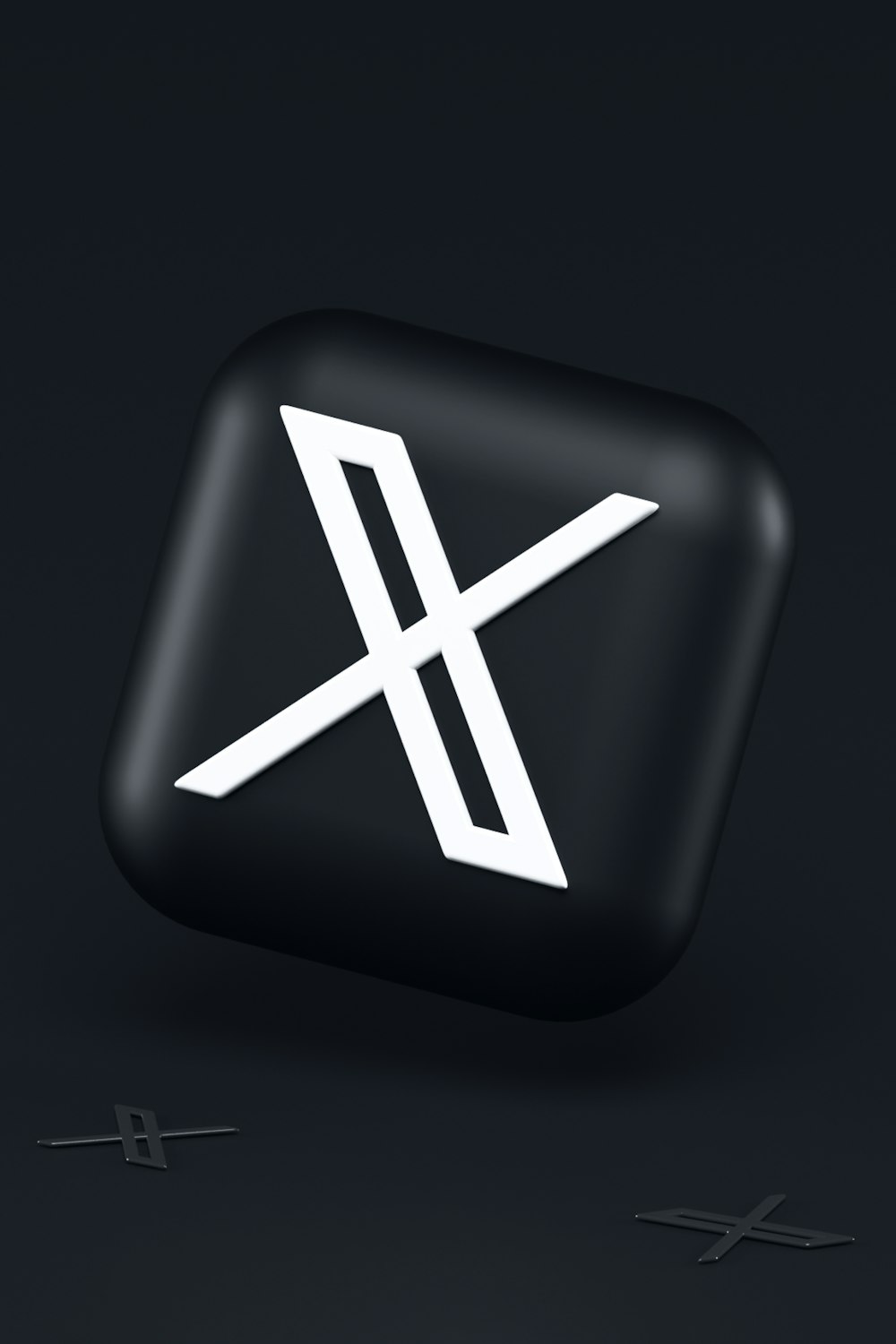 un pulsante nero con un simbolo bianco su di esso