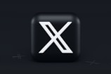 a black square button with a white x on it