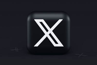 a black square button with a white x on it
