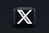 a black square button with a white x on it