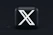 a black square button with a white x on it