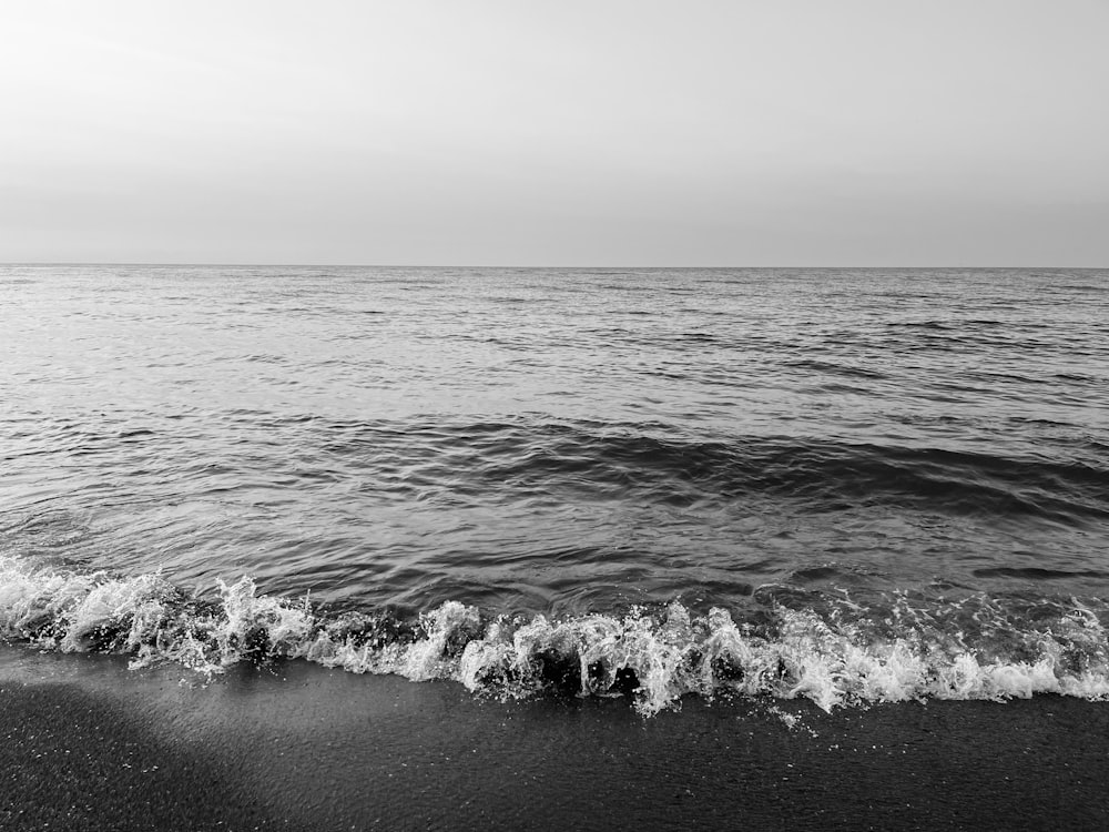 a black and white photo of the ocean