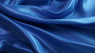 Deep royal blue silk with subtle sheen, draped elegantly to reveal fluidity.