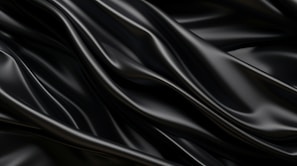 Black fabric flowing with subtle transparent liquid glass textures