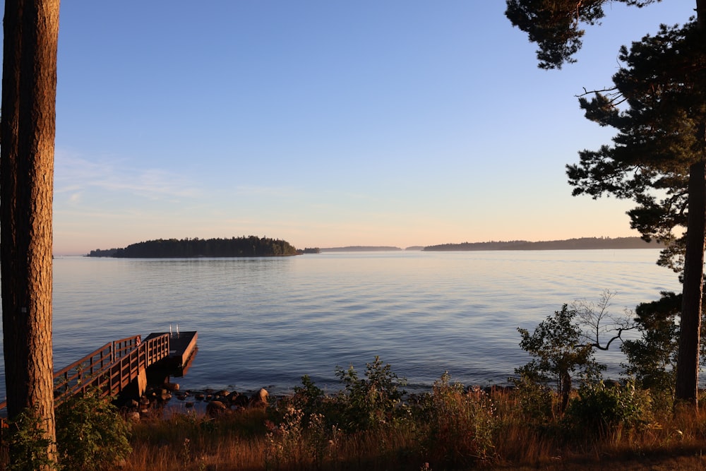 a dock on the shore of a large body of water