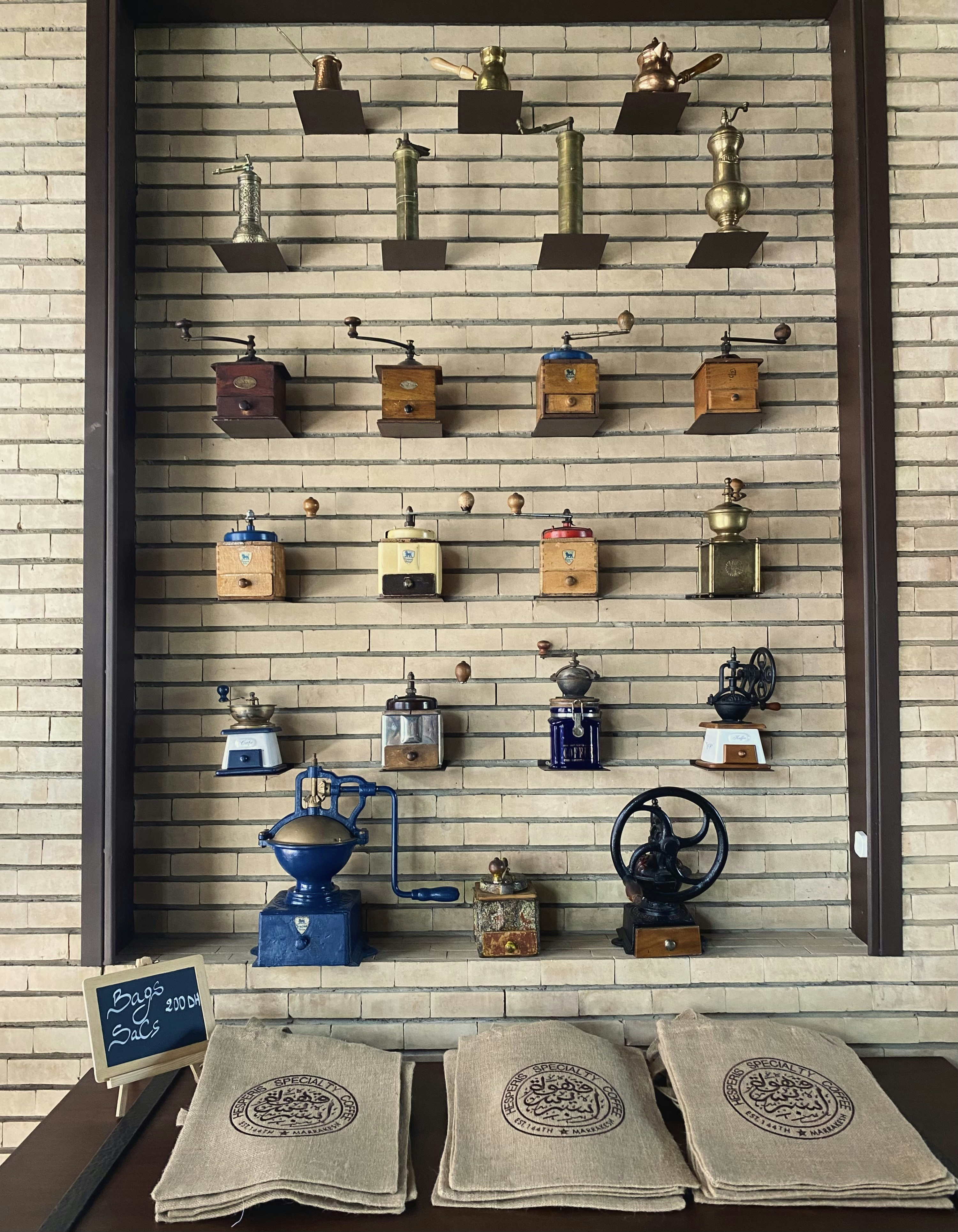 a coffee shop with coffee bags on the counter