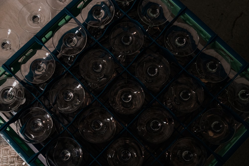 a bunch of wine glasses sitting on top of a table