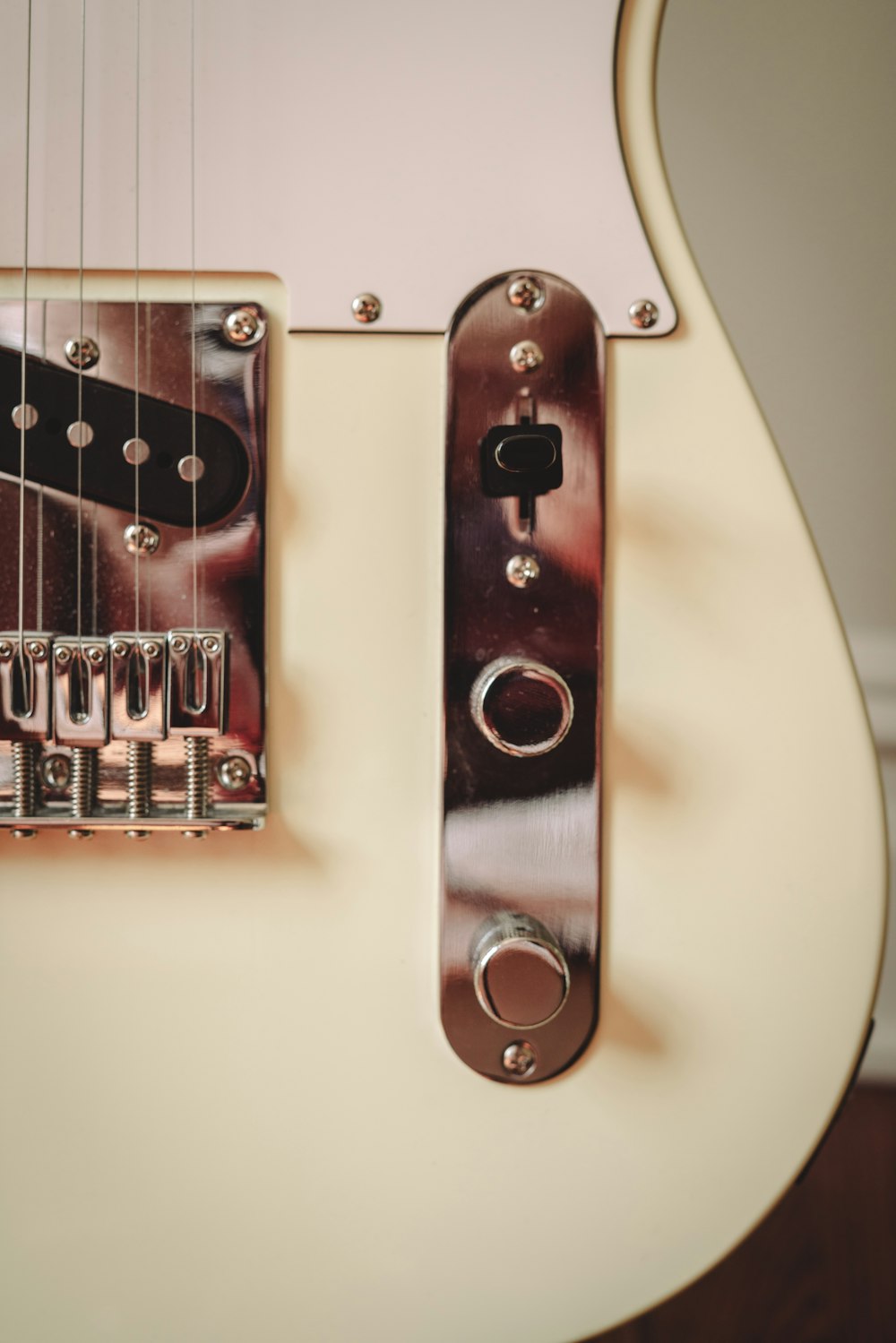 a close up of a guitar neck with a picture on it