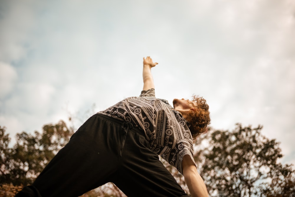 a man is doing a trick on a skateboard