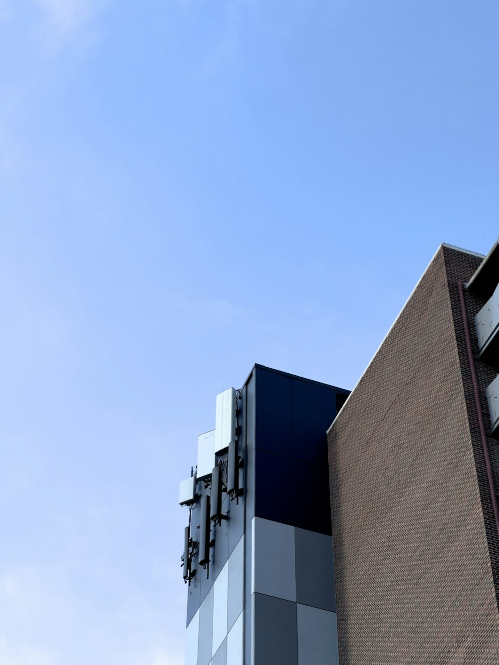 a tall building with a clock on the side of it