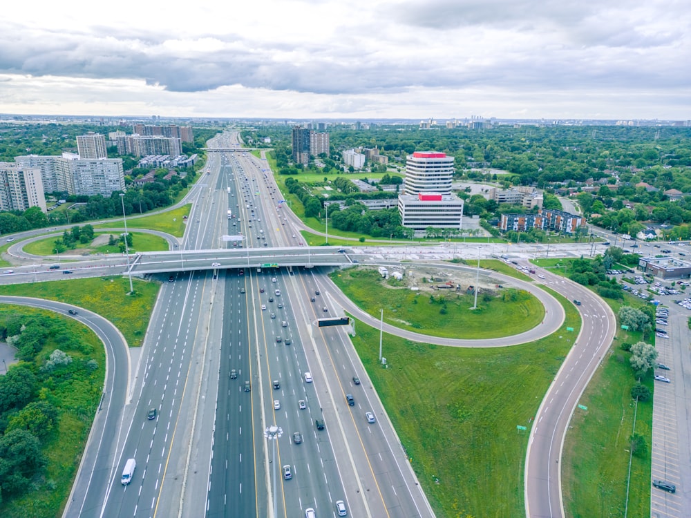 an aerial view of a highway intersection in a city