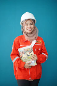 Icon representing workplace safety and legal compliance with a shield and checklist.