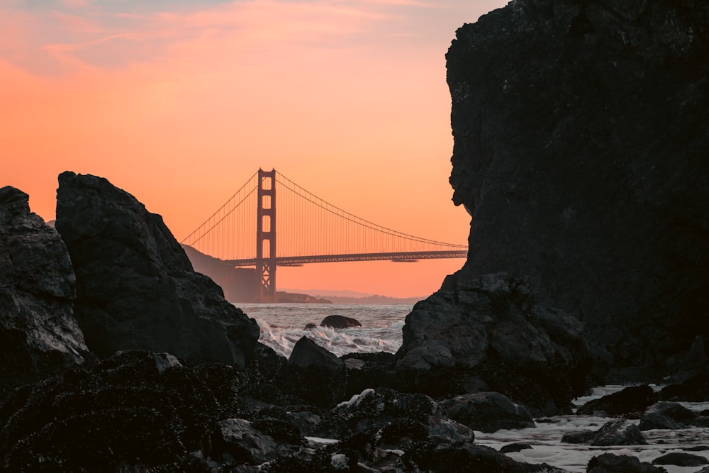 a view of the golden gate bridge at sunset